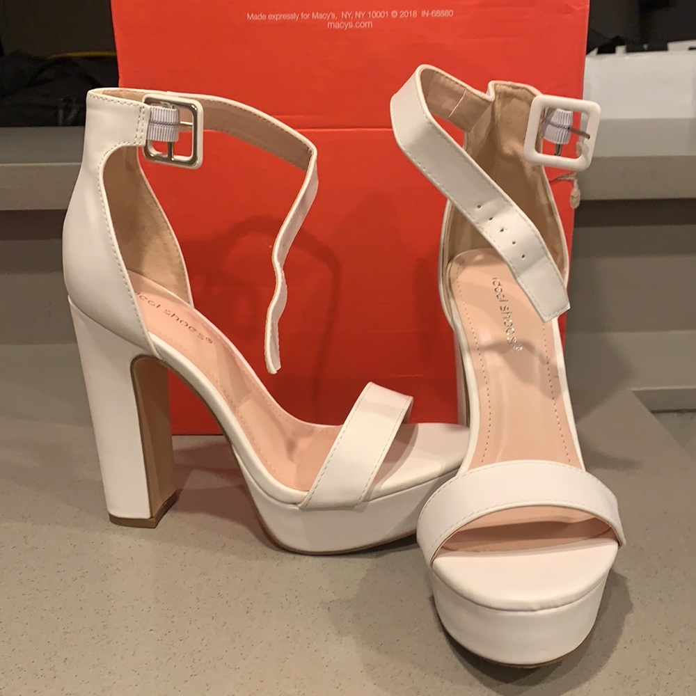 Never worn open toed heels. Size 7